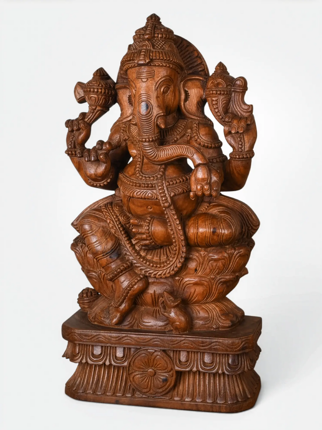 Traditional wooden Ganpati statue on lotus base for vastu and gifting