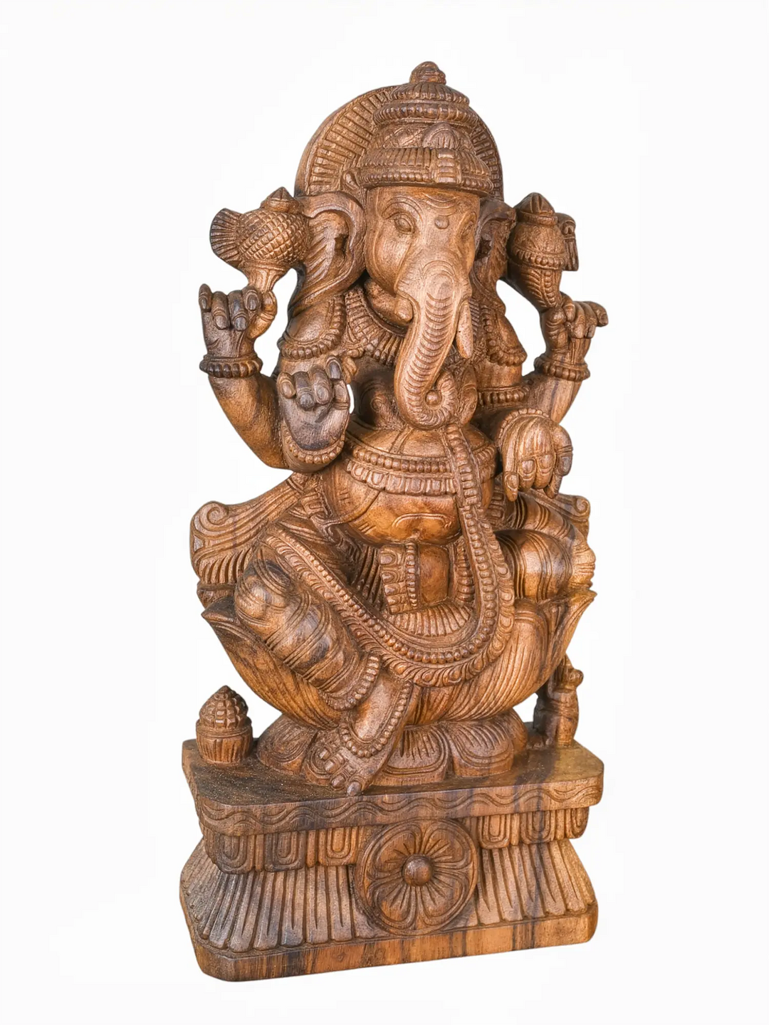 Classic wooden Ganesha murti created using traditional Indian wood carving techniques for luxury interiors
