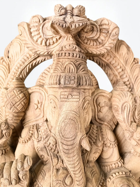 Intricately carved Lord Ganesha wooden sculpture for home entrance décor
