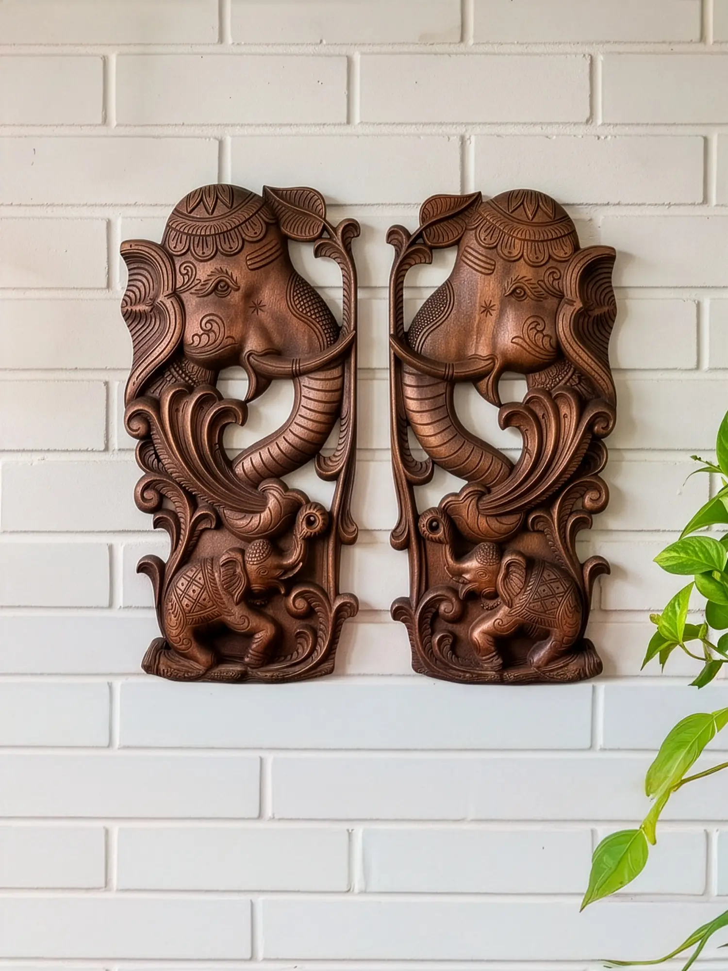 Finely carved wooden elephant wall hanging pairs with elegant home and office décor.
