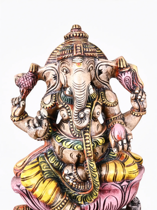 Handmade multicolour wooden Ganesha statue symbolizing wisdom, prosperity, and success.