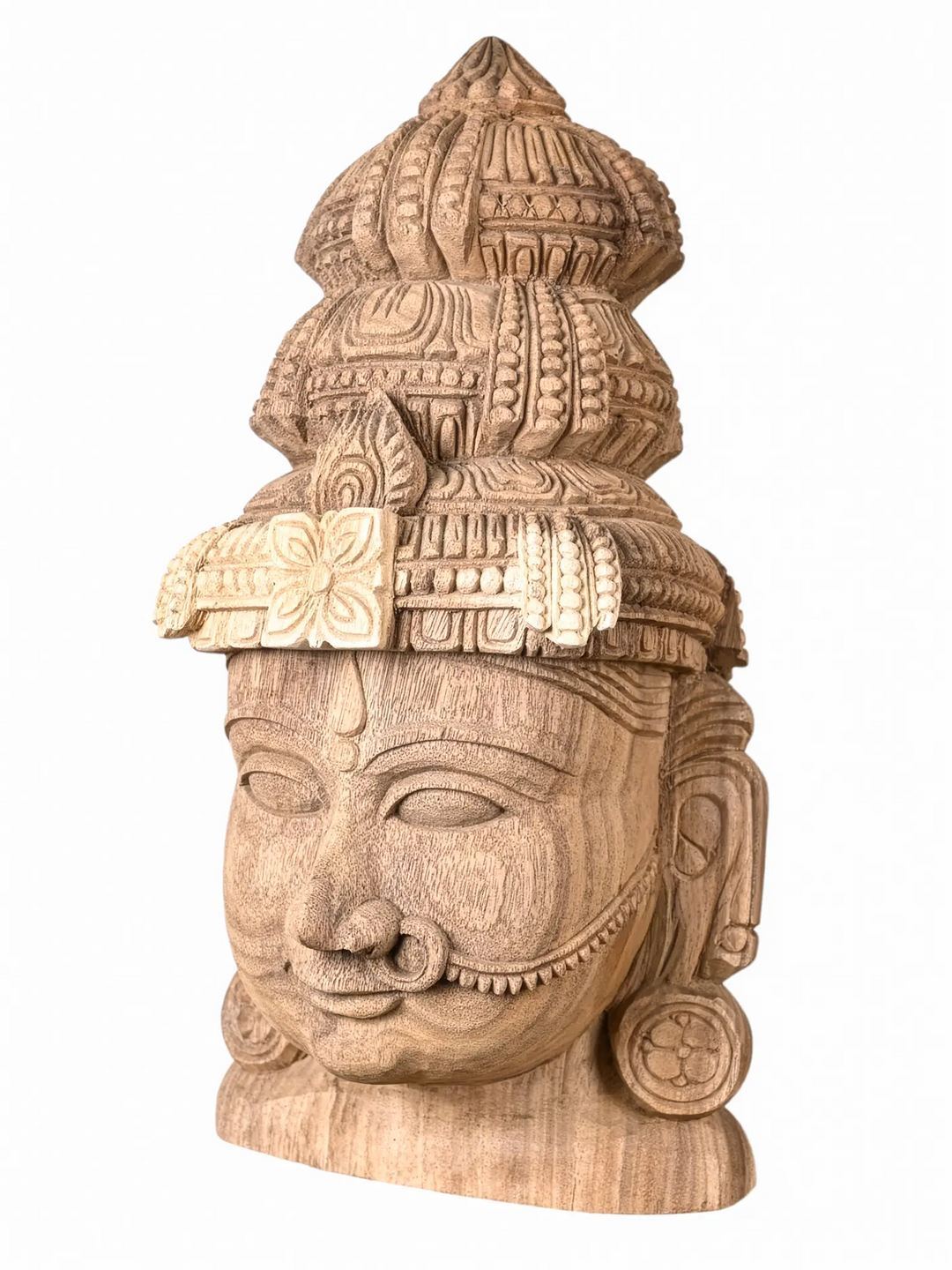 Finely carved wooden goddess sculpture combining traditional craftsmanship with modern elegance.