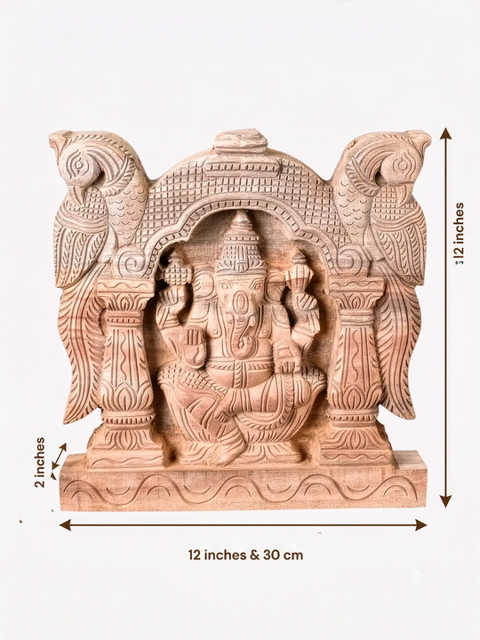 Wooden Ganesha religious wall panel showcasing fine artisan temple carving details.