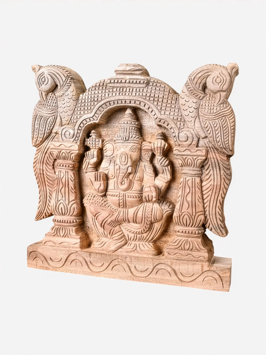 Hand-carved wooden Ganesha artwork with ornate peacock frame for devotional décor.
