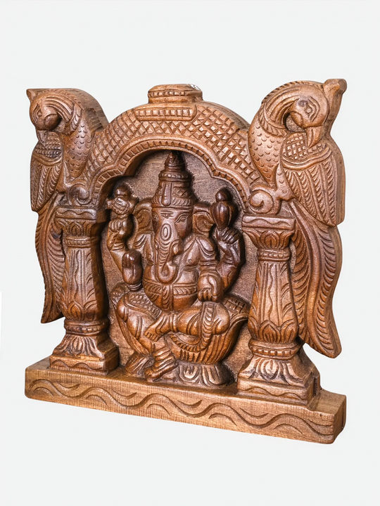 Handcrafted wooden Ganesha  with decorative twin parrots and temple arch