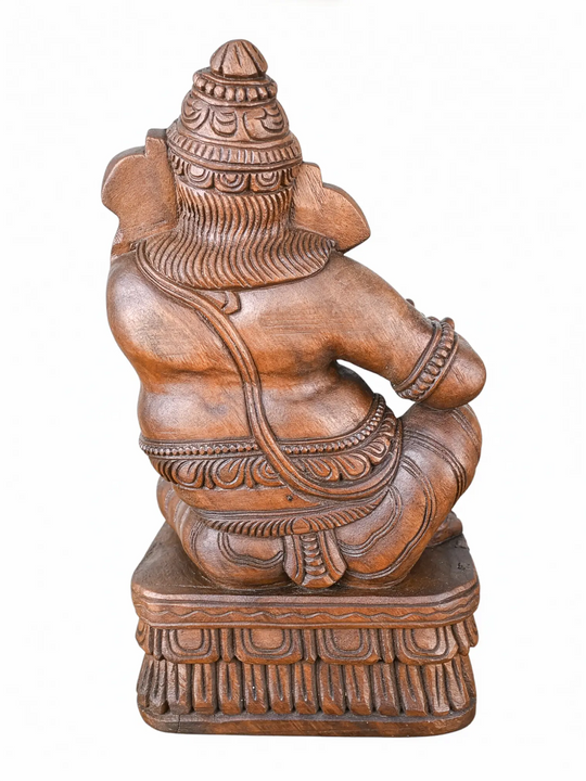 Premium wooden Ganesh idol with flute in antique finish.