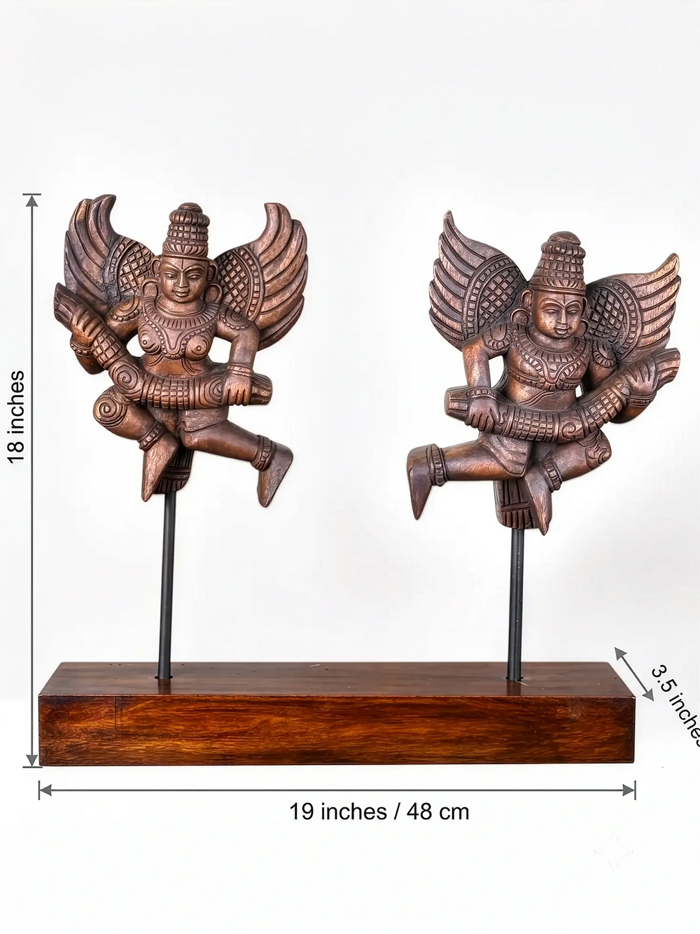 Handmade wooden Garuda idols with detailed artisan carving.