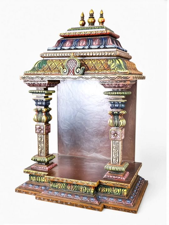 Handcrafted wooden pooja mandapam with traditional South Indian temple architecture.