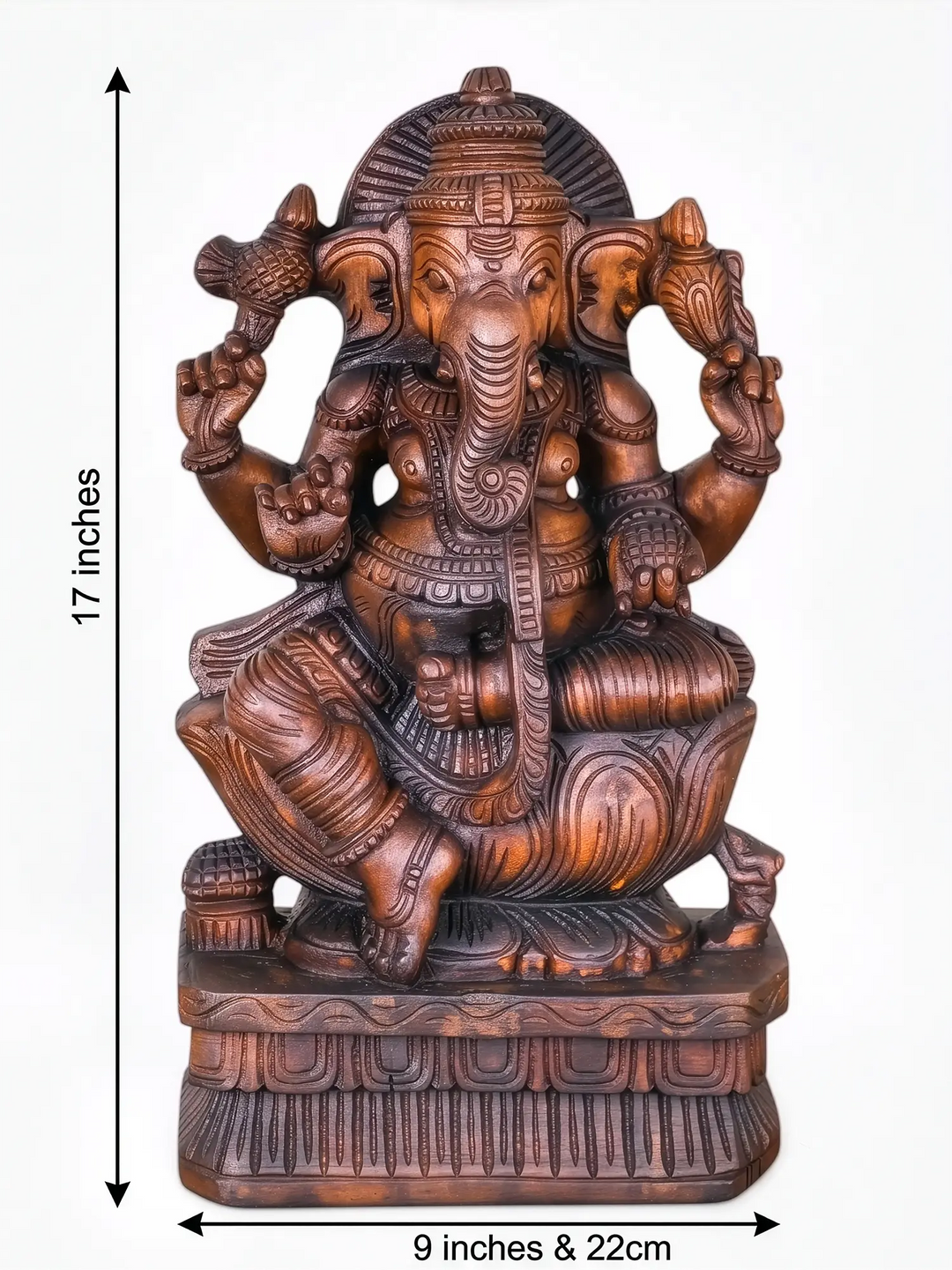 Handcrafted wooden Ganesha idol with traditional South Indian temple carving