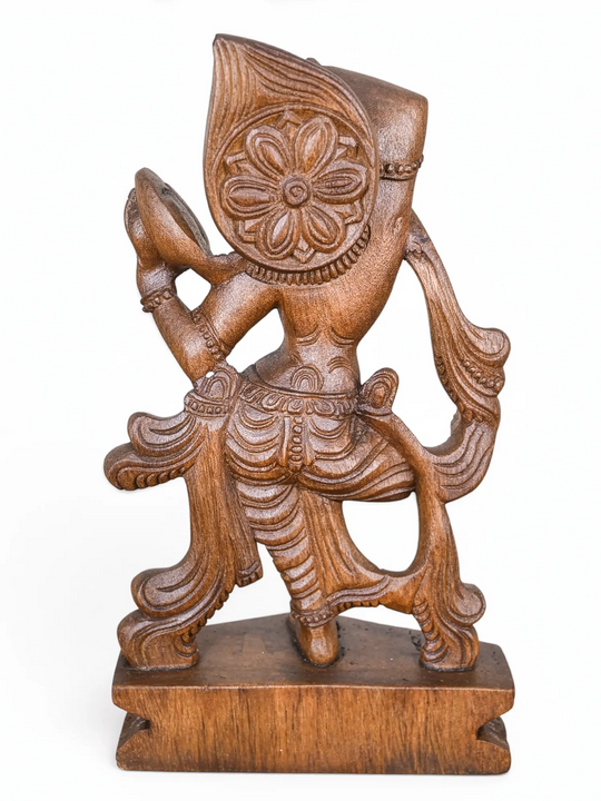 Handcrafted wooden Apsara dancer statue holding mirror with intricate temple carving.
