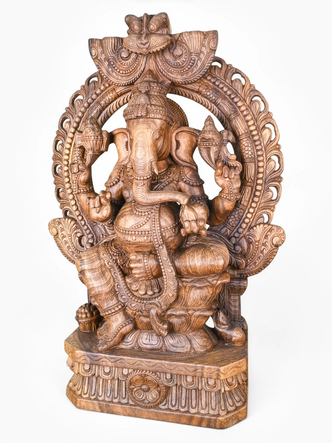 Traditional South Indian wooden Ganesh sculpture for pooja room.