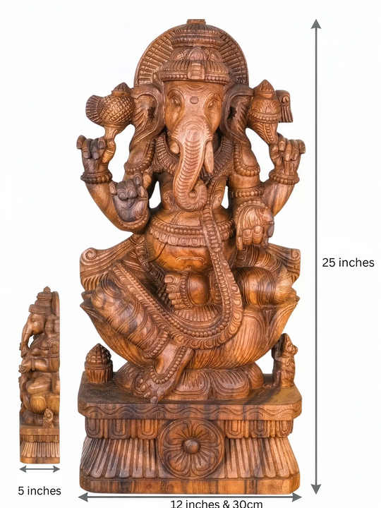 Hand-carved wooden Lord Ganesha statue seated on a lotus pedestal with intricate traditional Indian craftsmanship.