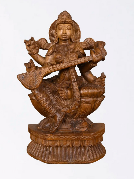 Traditional Saraswati wooden sculpture for pooja room