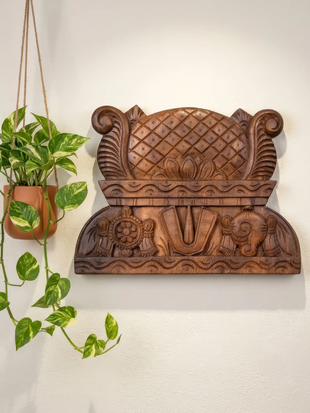 Handcrafted wooden Gopuram wall panel with traditional temple carvings
