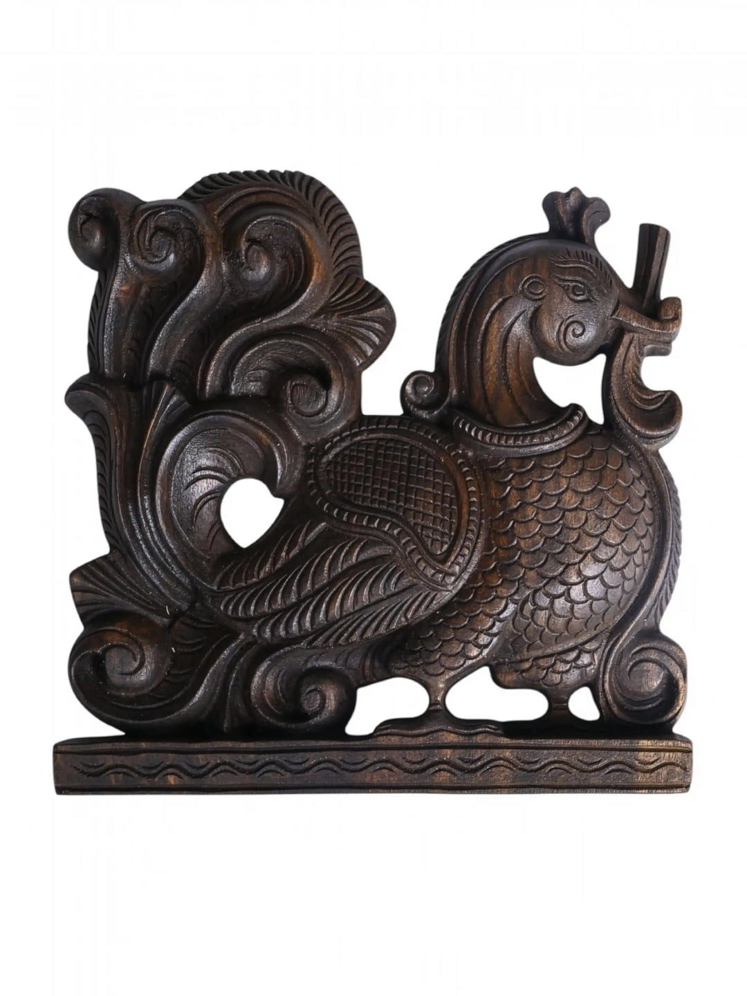 Side profile of a wooden Annapakshi corbel showing intricate relief