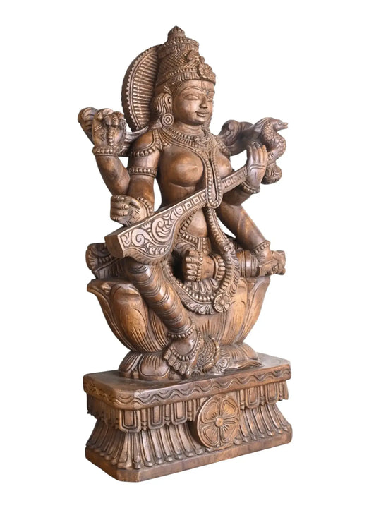 Traditional wooden Goddess Saraswathi sculpture
