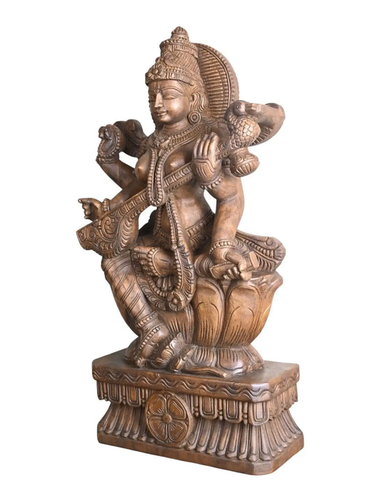 Traditional wooden Goddess Saraswathi sculpture