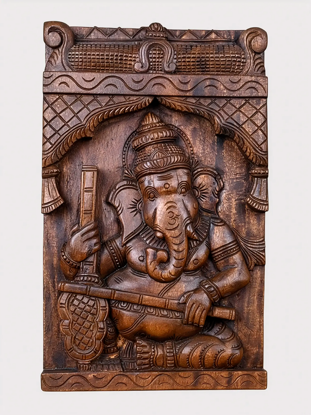 Handcrafted wooden Ganesha playing Veena wall Panel