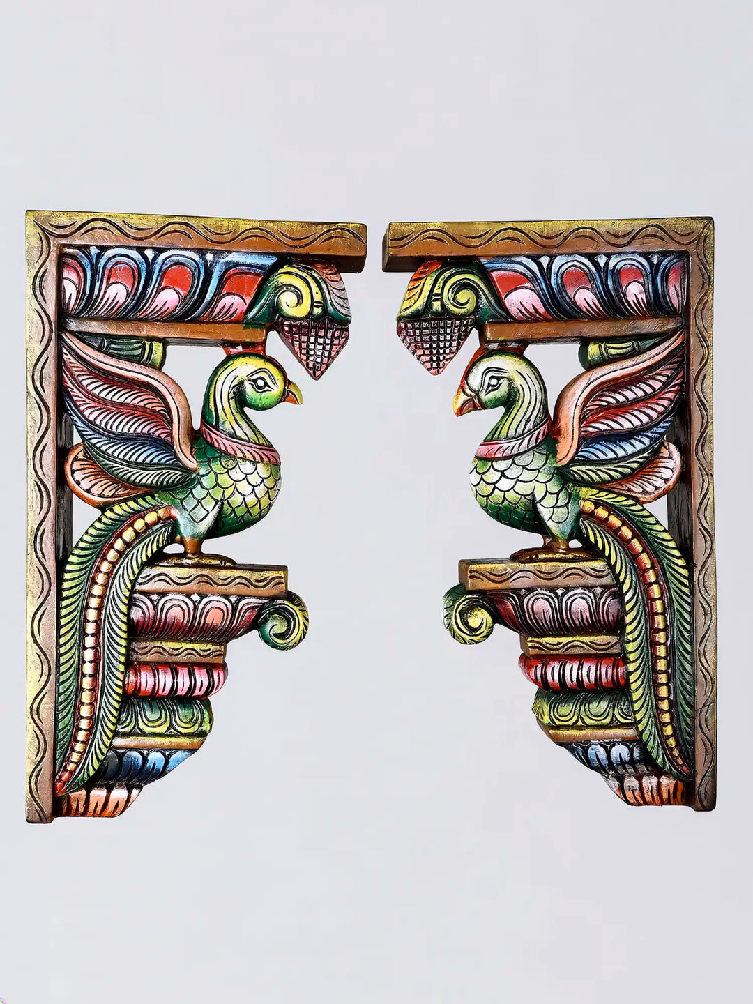 Traditional wooden parrot carving with vibrant colours