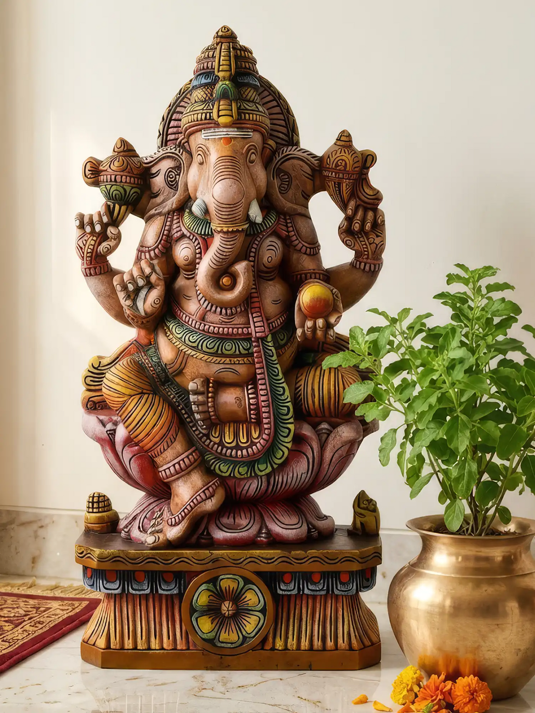 Colourful Lord Ganesh wooden sculpture with detailed carving