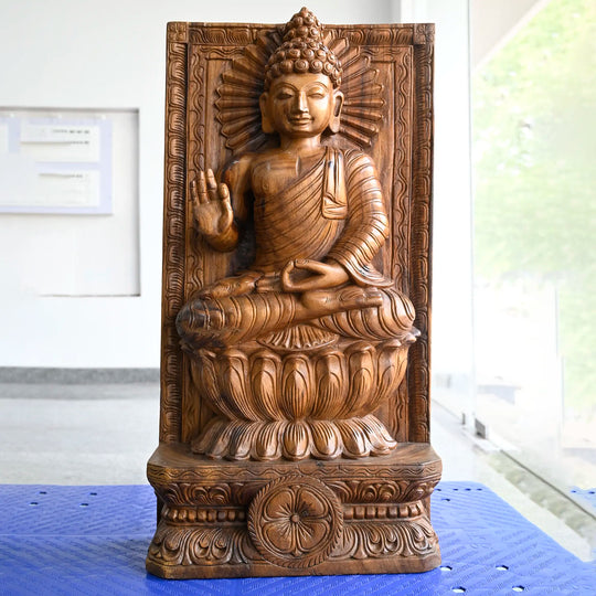 Natural wood Buddha statue handcrafted by artisans
