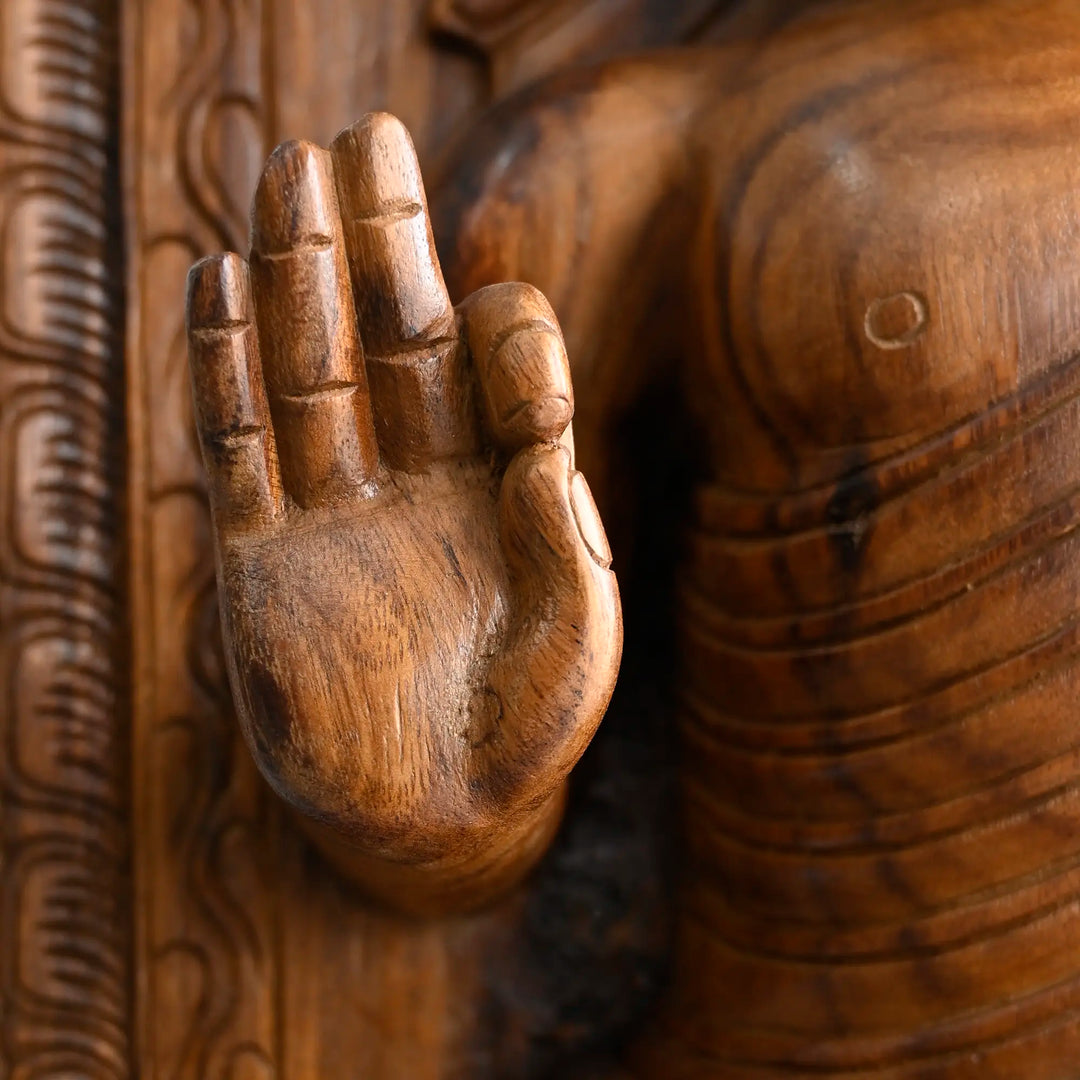 Artisan carved Buddha statue in natural wood