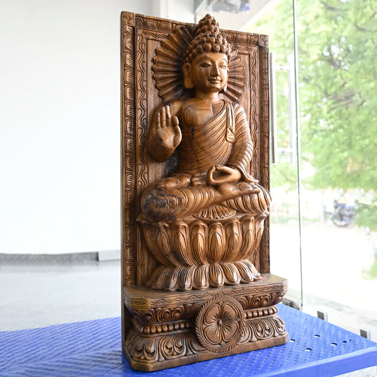 Natural wood Buddha statue handcrafted by artisans