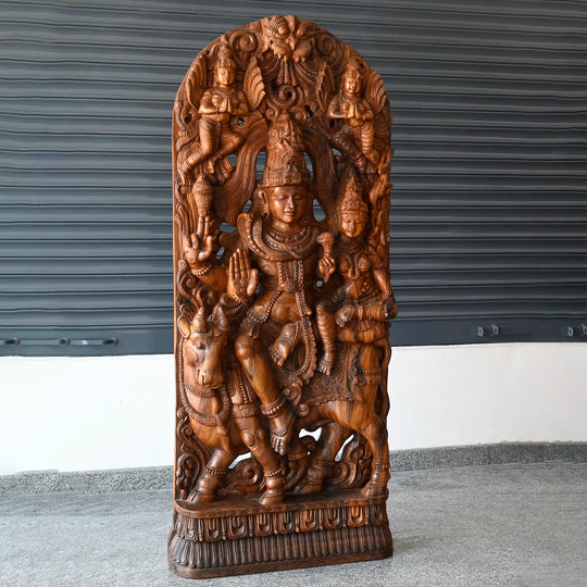 Artistic Hindu deity wooden statue featuring Shiva and Parvathy