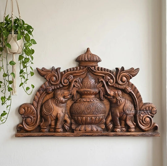 Traditional wooden Kalasam and elephant wall art for pooja room