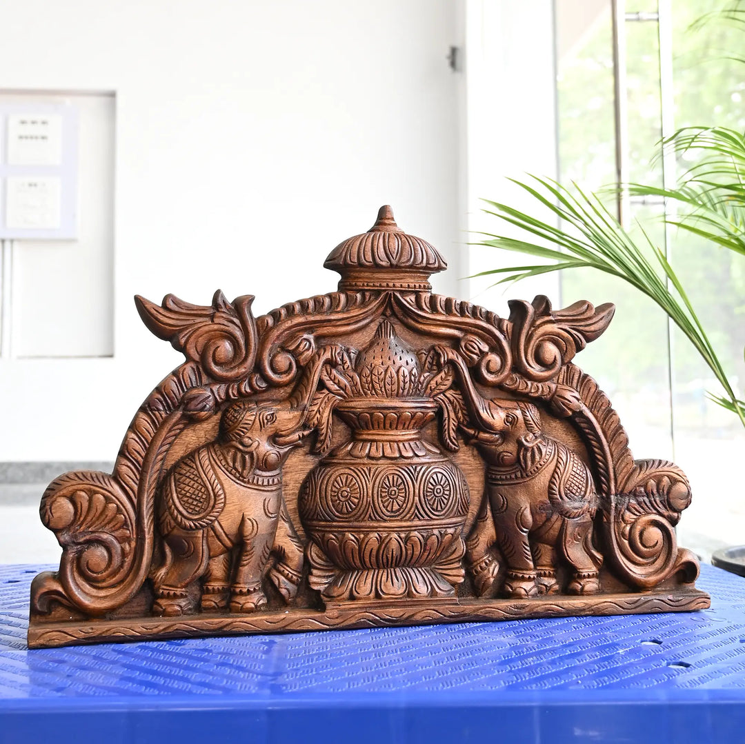 Kalasam elephant wood carving for traditional home decoration