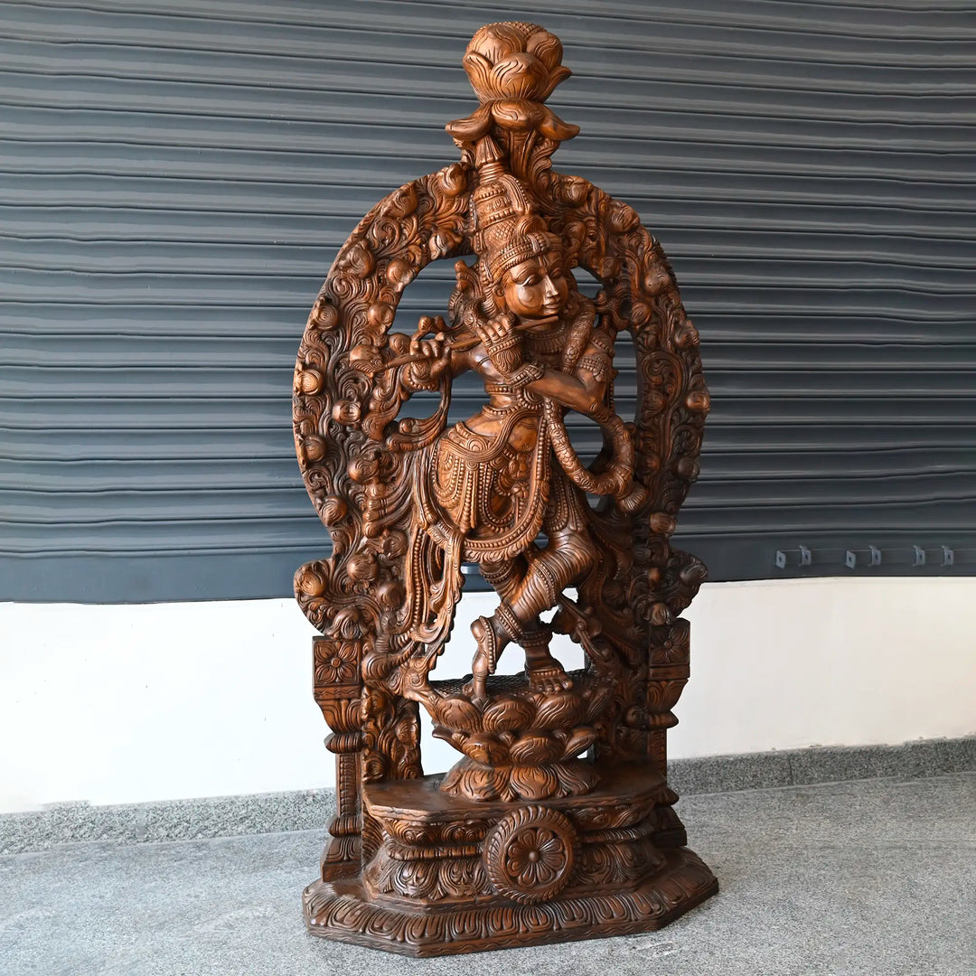 Detailed wooden Krishna moorthi showcasing South Indian craftsmanship