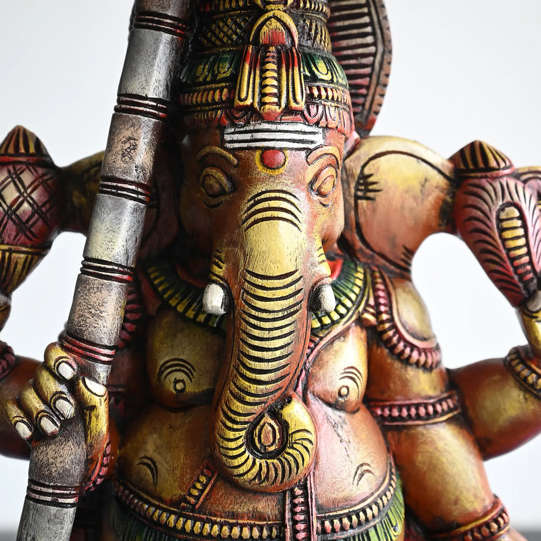 Umbrella Ganesh wooden statue for festive home decor