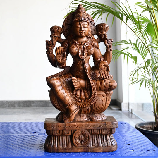 Handcrafted Mahalakshmi wooden sculpture by Sengottuvel Wood Carvings