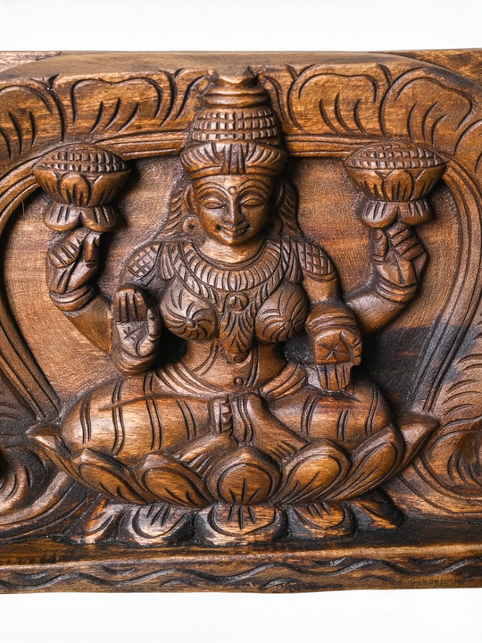 Decorative wooden Lakshmi carving for living room and temple.