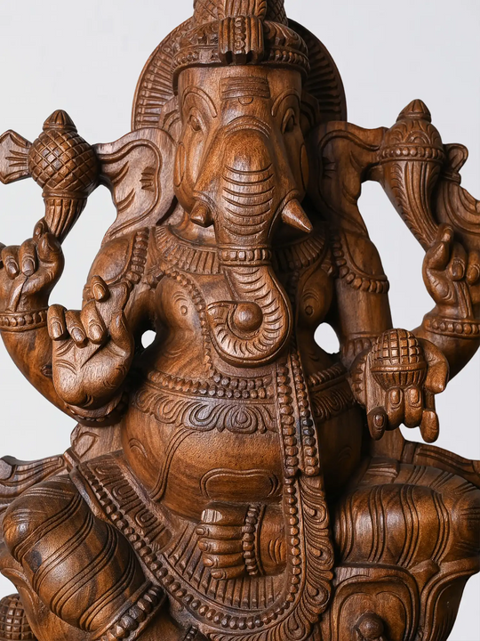 close up wooden Ganesh statue intricate design