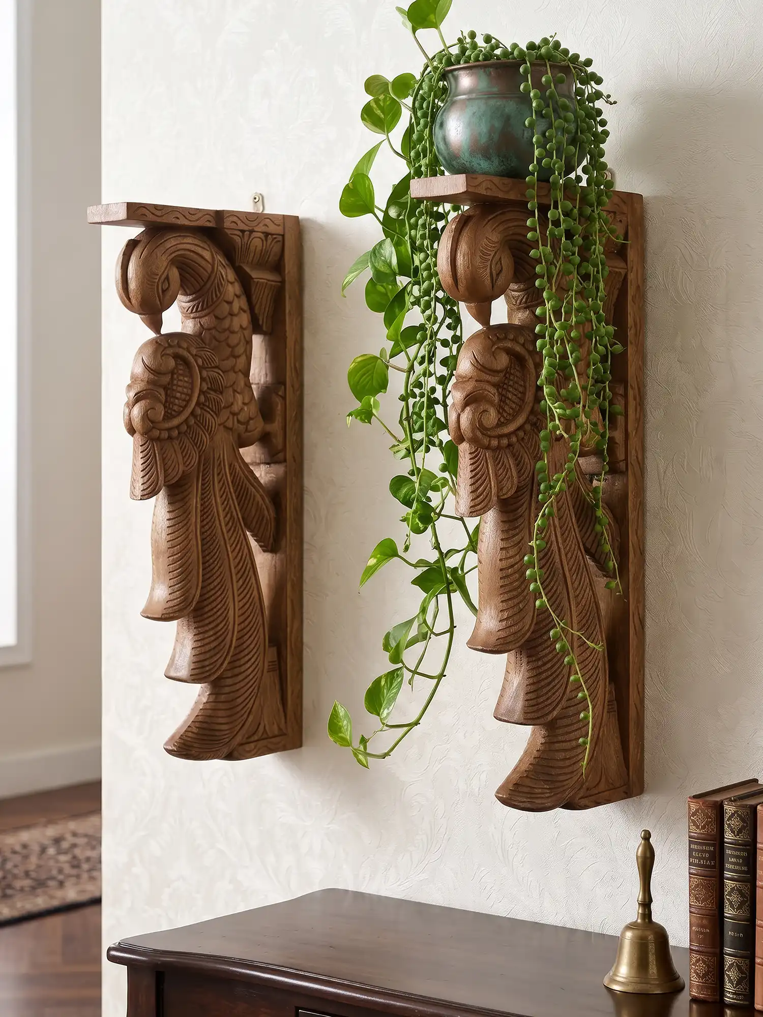Handcrafted wooden peacock corbels with intricate traditional carvings