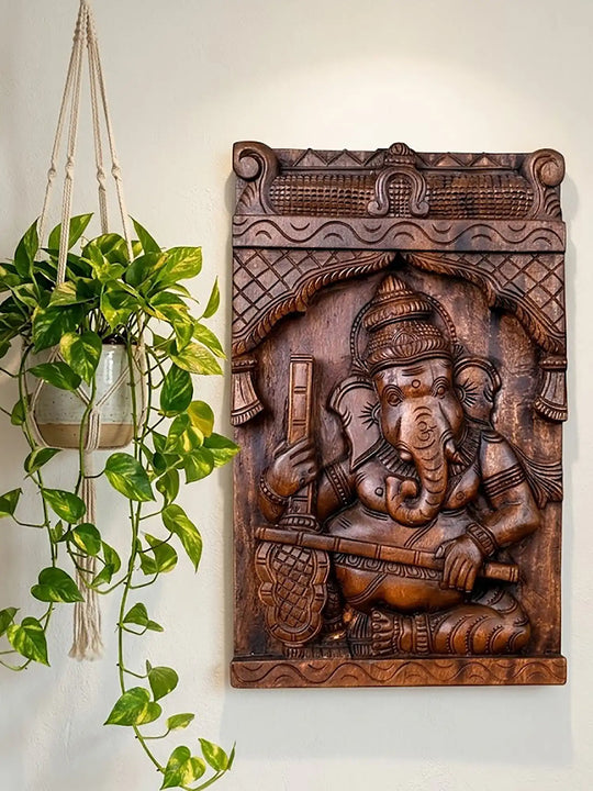 Handcrafted wooden Ganesha playing Veena wall Panel