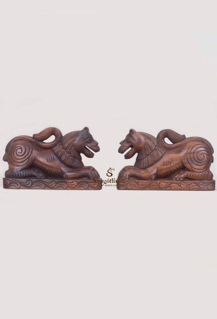 wooden pair of lion decoratives