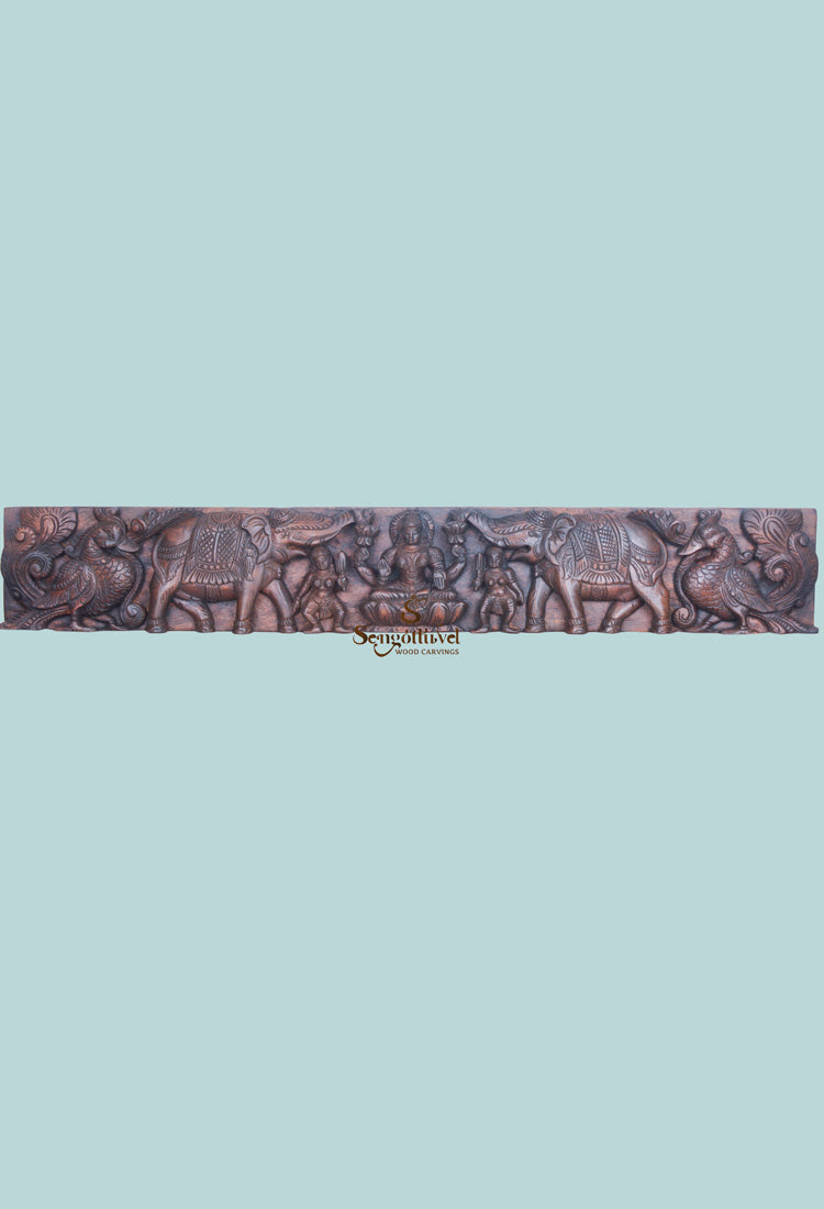 wooden Gajalakshmi panel with hamsa 